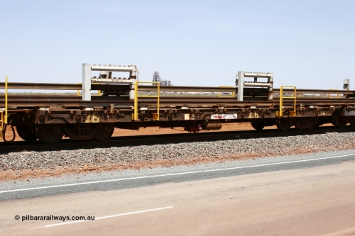 6014 Comeng WA 051001 5718
Boodarie, the Steel Train or rail recovery and transport train, flat waggon #26, 6015, a Comeng WA built flat waggon from 1971.
Keywords: Comeng-WA;BHP-rail-train;