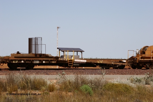 6011 Scotts of Ipswich Qld 051001 5738
Boodarie, the Steel Train or rail recovery and transport train, 1st lead off waggon 6011, built by Scotts of Ipswich 04-09-1970, the mesh guarding is for the winch cable. The chute arrangement for the discharging and recovery of rail is visible.
Keywords: Scotts-Qld;BHP-rail-train;