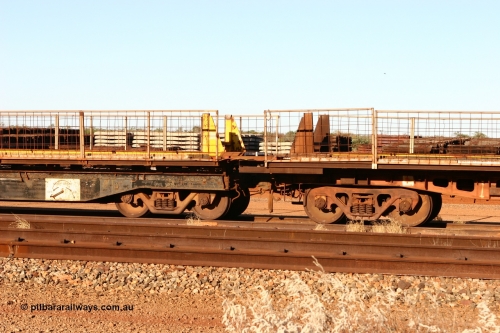 6704 060429 3755
Flash Butt yard, Pony re-laying waggon 6704 special flat waggon on the left coupled to a former Goldsworthy Mining 55 tonnes flat waggon built by Tomlinson Steel from 1966.
Keywords: BHP-pony-waggon;