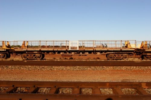 6001 Tomlinson Steel 060429 3759
Flash Butt yard, Pony re-laying waggon, 6001 originally built for Goldsworthy Mining as one of a batch of six with a 55 tonne rating by Tomlinson Steel in 1966 of which three were sold to Mt Newman Mining in 1967 and numbered 6001-6003.
Keywords: BHP-pony-waggon;Tomlinson-Steel-WA;GML;