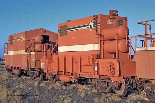 0661 Mt Newman Mining Workshops 257-13
Flash Butt yard, heavily modified Magor USA built ex-Oroville Dam ore waggon 661, seen here modified for LocoTrol service and testing. Locotrol waggon 2626, converted from a Comeng WA build ore waggon is behind 661.
Keywords: Magor-USA;BHP-Locotrol-waggon;