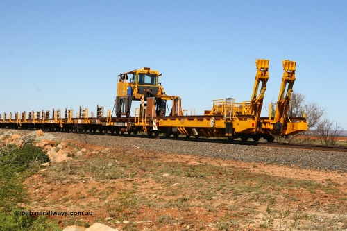 6214 Gemco WA 080621 2724
Tabba South, view from rear of new Lead-Off Lead-On waggon STTR class STTR 6214 on the end of the Steel Train or rail recovery and transport train, built by Gemco Rail WA, the chutes can be seen standing up with the squeeze rollers behind the mesh.
Keywords: Gemco-Rail-WA;BHP-rail-train;STTR-type;STTR6214;