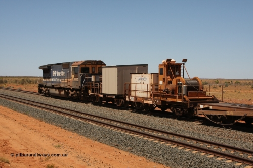 6702 Mt Newman Mining Workshops 081217 0451
Woodstock Siding, rail recovery and transport train flat waggon #30, 6702, heavily cut down and modified Magor USA ore waggon by Mt Newman Mining workshops, converted to a 50 tonne flat waggon and designated the winch waggon with generator set to power the winch and the crib car.
Keywords: Magor-USA;Mt-Newman-Mining-WS;BHP-rail-train;
