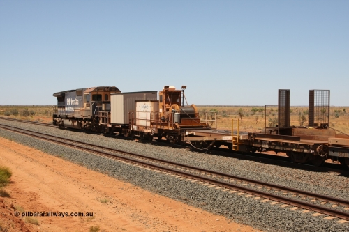 6011 Scotts of Ipswich Qld 081217 0452
Woodstock Siding, rail recovery and transport train, waggon #29, 1st lead off waggon 6011, built by Scotts of Ipswich Qld on 04-09-1970, the mesh guarding is for the winch cable. The chute arrangement for the discharging and recovery of rail is visible.
Keywords: BHP-rail-train;Scotts-Qld;