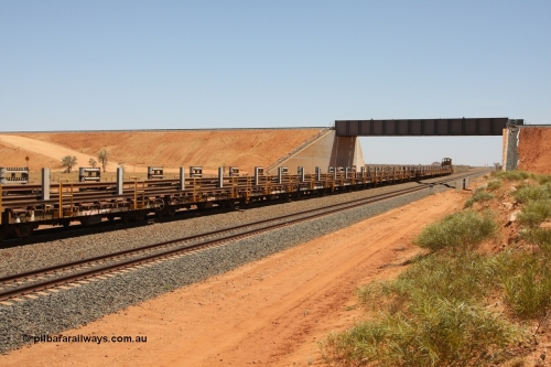 081217 0453
Woodstock Siding, looking north with the FMG overbridge as the rail recovery and transport train travels south on the mainline. Flat waggon #18 nearest camera.
Keywords: BHP-rail-train;