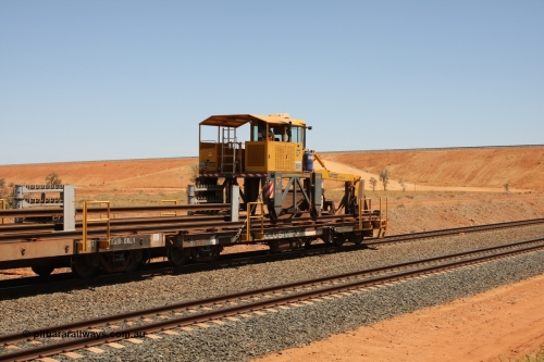 6203 Comeng WA 081217 0456
Woodstock Siding, rail recovery and transport train flat waggon #1, rear lead off waggon 6203, built by Comeng WA in January 1977 under order number 07-M-282 RY. The straddle crane is a newish unit built by Vaia Car model no. TCR-V and the four wheels are chain driven, replacing the original Gemco hydraulic unit.
Keywords: Comeng-WA;BHP-rail-train;