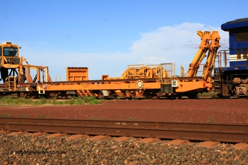 6214 Gemco WA 110208 9429
Flash Butt yard, new Lead-Off Lead-On waggon STTR class STTR 6214 on the end of the Steel Train or rail recovery and transport train, built by Gemco Rail WA, the chutes can be seen standing up with the squeeze rollers behind the mesh.
Keywords: Gemco-Rail-WA;BHP-rail-train;STTR-type;STTR6214;
