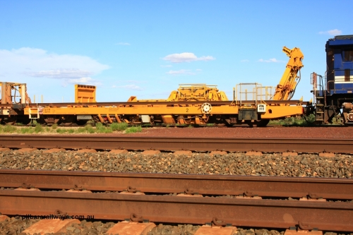 6214 Gemco WA 110208 9430
Flash Butt yard, new Lead-Off Lead-On waggon STTR class STTR 6214 on the end of the Steel Train or rail recovery and transport train, built by Gemco Rail WA, the chutes can be seen standing up with the squeeze rollers behind the mesh.
Keywords: Gemco-Rail-WA;BHP-rail-train;STTR-type;STTR6214;