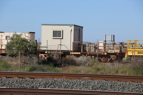 0665 Mt Newman Mining Workshops 130720 1557
Flash Butt yard, out of service crib waggon a cut down Magor USA built Oroville ore waggon, seen here with a new Ausco donga replacing the original ATCO unit.
Keywords: Magor-USA;Mt-Newman-Mining-WS;BHP-rail-train;