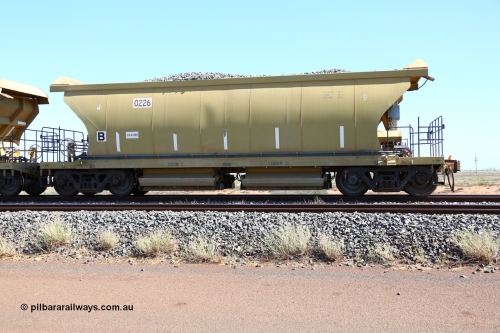 0226 CNR - QRRS China 150729 9458
Bing Siding, loaded CNR-QRRS of China built 60 m3 capacity ballast waggon 0226, loaded with ballast.
Keywords: CNR-QRRS-China;BHP-ballast-waggon;