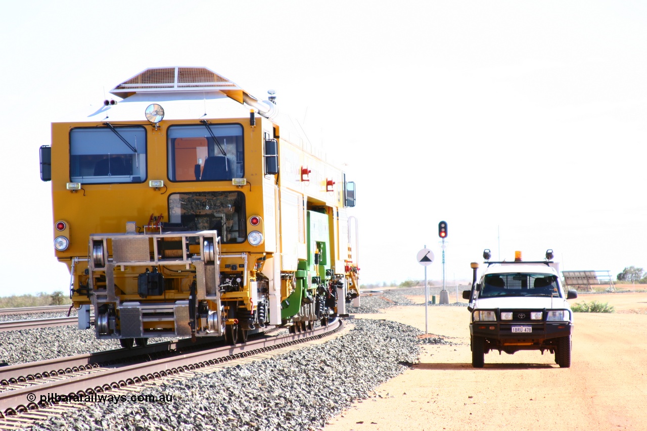 050625 3610
Mooka North, BHP's new Tamper 3 track machine a Plasser Australia 09-3X model serial M480, over exposed shot to highlight the front of the unit in shadow. 25th June 2005.
Keywords: Tamper3;Plasser-Australia;09-3X;M480;track-machine;