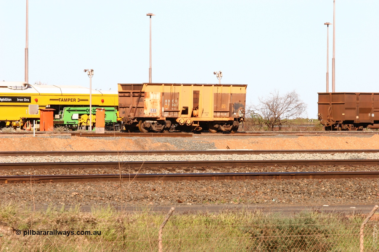 050801 4720
Nelson Point yard, ballast plough waggon 538, modified by the Mt Newman workshops from an Magor USA built Oroville Dam ore waggon and originally coded ODCX 82160 which is still visible. 1st August 2005.
Keywords: 538;Mt-Newman-Mining-WS;ODCX-82160;track-machine;