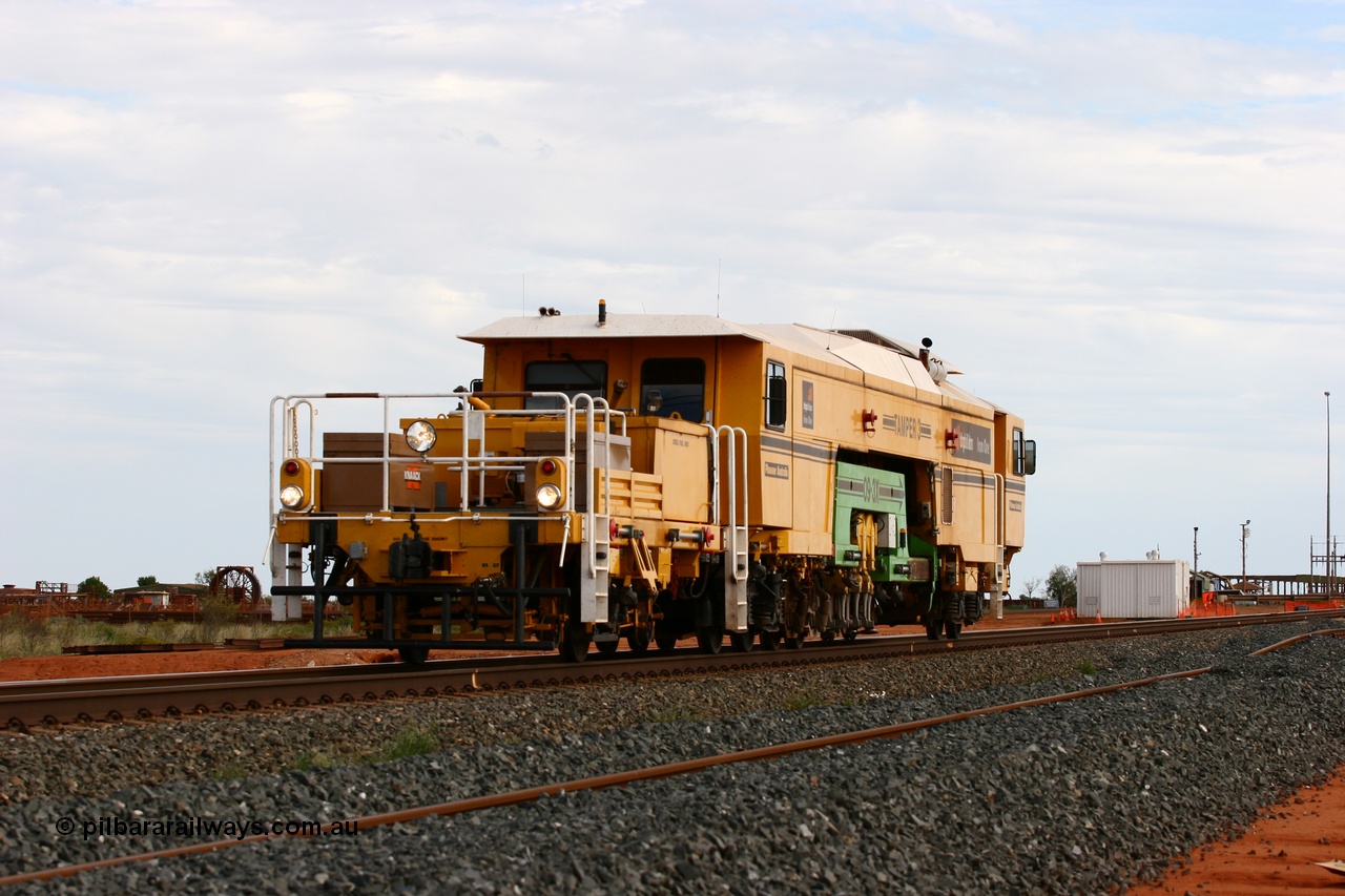 060326 3217
Goldsworthy Junction, BHP track machine Tamper 3 a Plasser Australia unit model 09-3X serial M480 runs towards Nelson Point on the mainline with the new duplicated line being constructed in the foreground. 26th March 2006.
Keywords: Tamper3;Plasser-Australia;09-3X;M480;track-machine;