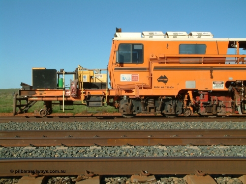 040408 162741
Mooka Siding north backtrack, side view of the driving cab end of BHP's mainline Tamper 1, Plasser Australia 09-32 CAT model with serial 306. 8th April 2004.
Keywords: Tamper1;Plasser-Australia;09-32-CAT;306;track-machine;