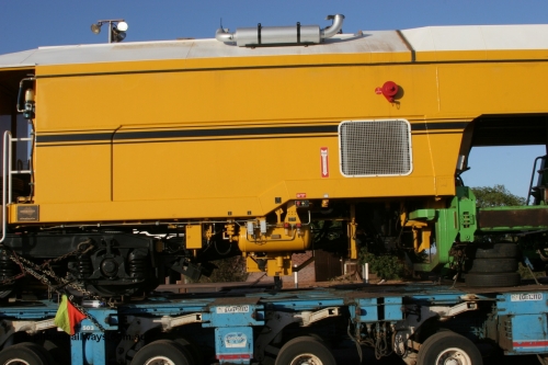 050409 0409
Shell Swagman Roadhouse, Lampson eighty wheel float ready to deliver BHP's new mainline tamper a Plasser Australia 09-3X model with serial M480 view of engine compartment. 9th April 2005.
Keywords: Tamper3;Plasser-Australia;09-3X;M480;track-machine;