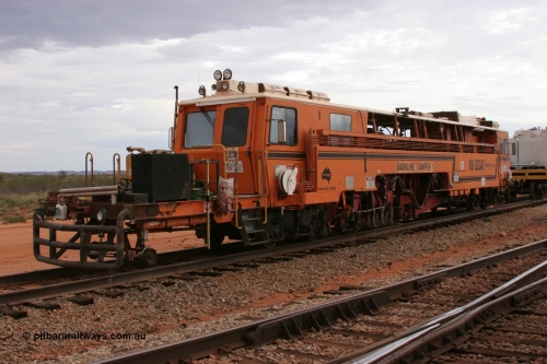 050412 0813
Abydos Siding backtrack, view of the rear of BHP's Mainline Tamper 1, a Plasser Australia 09-32 CAT model tamper serial 306 built in 1986. 12th April 2005.
Keywords: Tamper1;Plasser-Australia;09-32-CAT;306;track-machine;