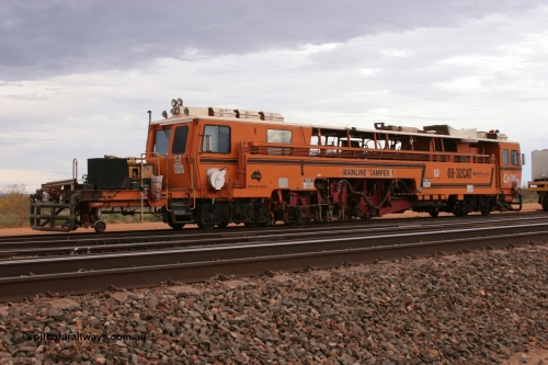 050412 0814
Abydos Siding backtrack, view of the rear of BHP's Mainline Tamper 1, a Plasser Australia 09-32 CAT model tamper serial 306 built in 1986. 12th April 2005.
Keywords: Tamper1;Plasser-Australia;09-32-CAT;306;track-machine;