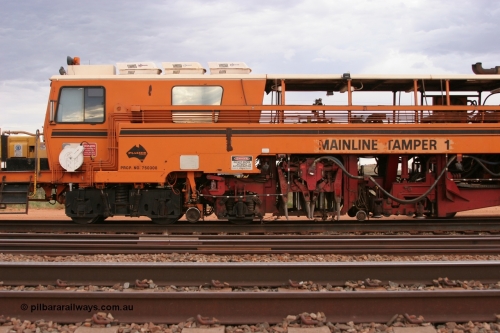 050412 0816
Abydos Siding backtrack, view of cab side and the tamper mechanism of BHP's Mainline Tamper 1, a Plasser Australia 09-32 CAT model tamper serial 306 built in 1986. 12th April 2005.
Keywords: Tamper1;Plasser-Australia;09-32-CAT;306;track-machine;