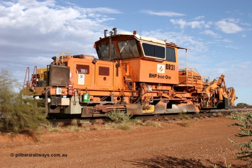 050421 1142
Gillam Siding backtrack, BHP's ballast regulator BR 31 a Plasser Australia SSP 110SW model serial 401, 94.9 km marking on the rail. 21st April 2005.
Keywords: BR31;Plasser-Australia;SSP-110SW;401;track-machine;