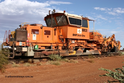 050421 1145
Gillam Siding backtrack, BHP's ballast regulator BR 31 a Plasser Australia SSP 110SW model serial 401, over view. 21st April 2005.
Keywords: BR31;Plasser-Australia;SSP-110SW;401;track-machine;