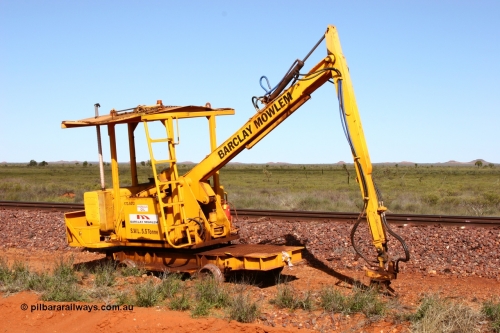 050625 3812
Node 2 at the 38 km on the GML or former Goldsworthy mainline, a Barclay Mowlem track machine sleeper crane off clear of the running lines. 25th June 2005.
Keywords: track-machine;