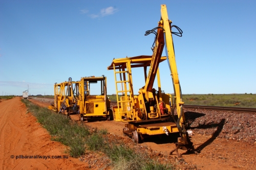 050625 3820
Node 2 at the 38 km on the GML or former Goldsworthy mainline, some Barclay Mowlem track machines are off clear of the running lines, a sleeper crane is at the front with three sleeper inserters behind. 25th June 2005.
Keywords: track-machine;