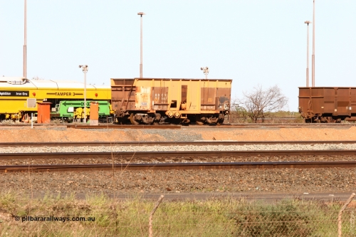 050801 4720
Nelson Point yard, ballast plough waggon 538, modified by the Mt Newman workshops from an Magor USA built Oroville Dam ore waggon and originally coded ODCX 82160 which is still visible. 1st August 2005.
Keywords: 538;Mt-Newman-Mining-WS;ODCX-82160;track-machine;