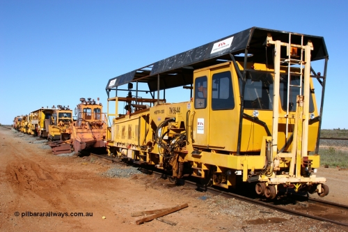 050801 4758
In the Flash Butt yard a line up of Barclay Mowlem track machines from the closest to the camera, tamper, regulator, regulator, tamper, clip installer, tamper then BHP's mainline tamper. 1st August 2005.
Keywords: TM8644;Tamper;HSTR-130;3581011;track-machine;