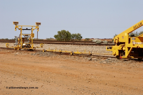 051001 5672
Flash Butt yard, Jackson model 6700 tamper serial 153246 lettered for Railway Equipment Leasing And Maintenance RELAM Inc undergoing delivery checks view of the light buggy and rods. 1st October 2005.
Keywords: Jackson;6700;153246;track-machine;