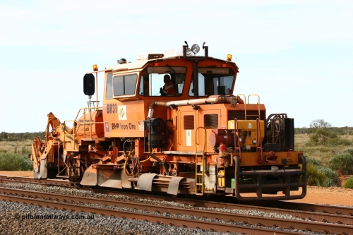 060326 3202
Bing Siding, south arrival with the mainline in the foreground as ballast regulator BR 31 a Plasser Australia SSP 110SW model serial 401 takes the passing track. 26th March 2006.
Keywords: BR31;Plasser-Australia;SSP-110SW;401;track-machine;