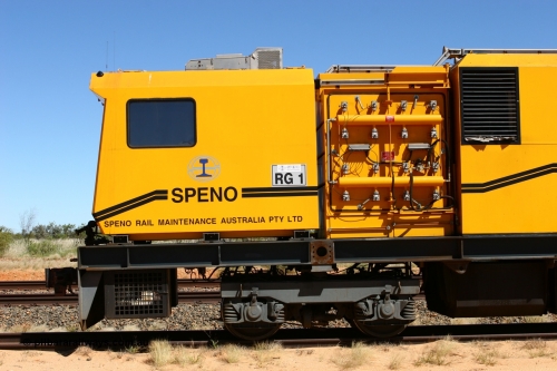 060501 3925
Abydos Siding backtrack, Speno rail grinder RG 1, a RR24 model grinder with 24 grinding wheels, serial M20, generating set and second driving cab module, cab side view. 1st May 2006.
Keywords: RG1;Speno;RR24;M20;track-machine;
