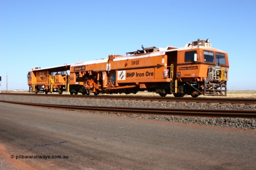 060710 6228
At the Broome Rd grade crossing Port Hedland, Switch Tamper SW 02 a Plasser Australia model Unimat S4 switch tamper. 10th July 2006.
Keywords: SW02;Plasser-Australia;Unimat-4S;track-machine;