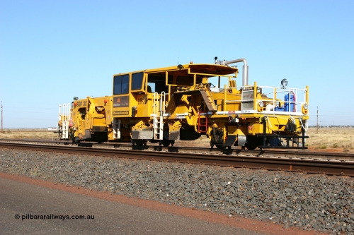 060710 6232
At the Broome Rd grade crossing Port Hedland, track machine BR 33 a Plasser Australia ballast regulator model SSP 302 serial M486. 10th July 2006.
Keywords: BR33;Plasser-Australia;SSP-302;M486;track-machine;
