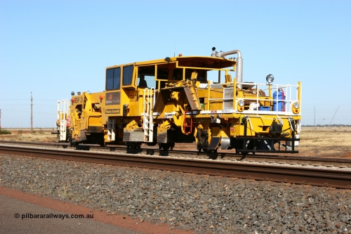 060710 6233
At the Broome Rd grade crossing Port Hedland, track machine BR 33 a Plasser Australia ballast regulator model SSP 302 serial M486. 10th July 2006.
Keywords: BR33;Plasser-Australia;SSP-302;M486;track-machine;