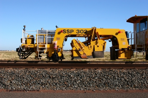 060710 6239
At the Broome Rd grade crossing Port Hedland, track machine BR 33 a Plasser Australia ballast regulator model SSP 302 serial M486. 10th July 2006.
Keywords: BR33;Plasser-Australia;SSP-302;M486;track-machine;