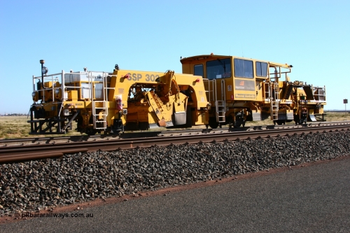 060710 6240
At the Broome Rd grade crossing Port Hedland, track machine BR 33 a Plasser Australia ballast regulator model SSP 302 serial M486. 10th July 2006.
Keywords: BR33;Plasser-Australia;SSP-302;M486;track-machine;