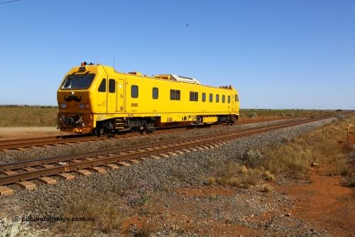 190911 4755
Port Hedland, Broome Rd crossing, BHP's MM 800 track recording vehicle powers south on a recording run, still wearing it's Movember 'mo' as part of a men's health campaign, the MM 800 was built by Mermec in Italy and is a ROGER 800 model, ROGER is an acronym for Rilievo Ottico Geometria Rotaia, Italian for optical rail geometry control.
Keywords: MM800;Mermec-Italy;Roger-800;track-machine;