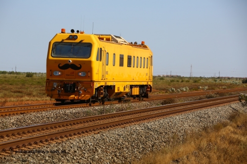 190911 4757
Port Hedland, Broome Rd crossing, BHP's MM 800 track recording vehicle powers south on a recording run, still wearing it's Movember 'mo' as part of a men's health campaign, the MM 800 was built by Mermec in Italy and is a ROGER 800 model, ROGER is an acronym for Rilievo Ottico Geometria Rotaia, Italian for optical rail geometry control.
Keywords: MM800;Mermec-Italy;Roger-800;track-machine;