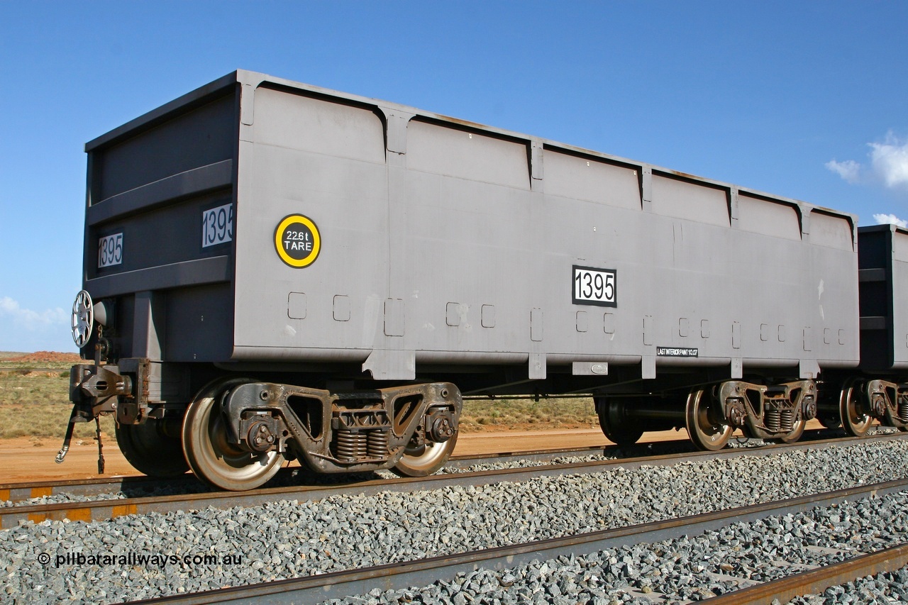 080116 1371
Chapman Siding 69 km, FMG slave waggon 1395 tare 22.6 tonnes with rotary coupler built by China Southern or CSR at their Zhuzhou Rolling Stock Works in China during 2007, stands on the passing track. 16th January 2008.
Keywords: 1395;CSR-Zhuzhou-Rolling-Stock-Works-China;FMG-ore-waggon;