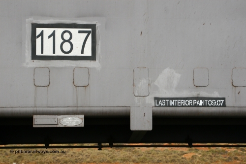 01187 080116 1376
Chapman Siding, FMG slave waggon 1187, built by China Southern or CSR at their Zhuzhou Rolling Stock Works in China during 2007, view of the number decal builders plate and bracket for RFID tag with the last painted date placard. 16th January 2008.
Keywords: 1187;CSR-Zhuzhou-Rolling-Stock-Works-China;FMG-ore-waggon;