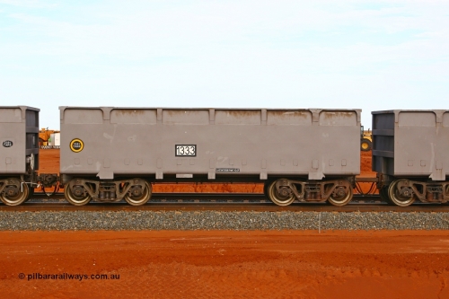 01333 080304 2178
Thomas Yard, down the rail welding end, side view of slave waggon 1333, the yellow circle around the tare weight 22.6 t indicates the rotary coupler end, built by China Southern or CSR at their Zhuzhou Rolling Stock Works in China in 2007. 4th March 2008.
Keywords: 1333;CSR-Zhuzhou-Rolling-Stock-Works-China;FMG-ore-waggon;