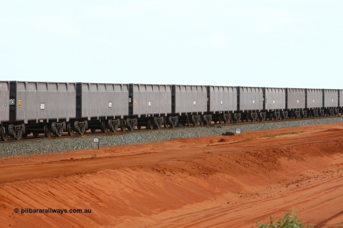 01593-02594 080304 2202
Thomas Yard, 21 km post looking north, long rake of waggons being run up and down the mainline to keep the wheels turning. 4th March 2008.
Keywords: FMG-ore-waggon;