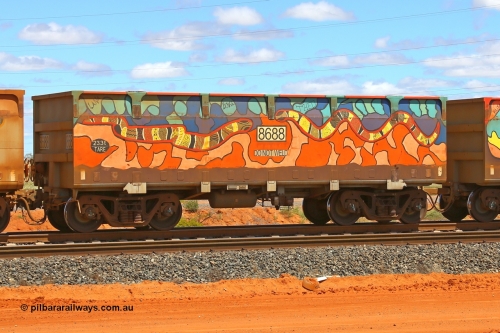 07687-08688 210321 9037
Boodarie, part of a loaded FMG train, painted ore waggon pair 7687 - 8688 built by CRRC Yangtze Rolling Stock Co. of China in 2018, 8688 waggon view, it features mural painting by students of South Hedland High School and was painted in August 2018. March 21, 2021.
Keywords: 7687-8688;CRRC-Yangtze-China;FMG-ore-waggon;