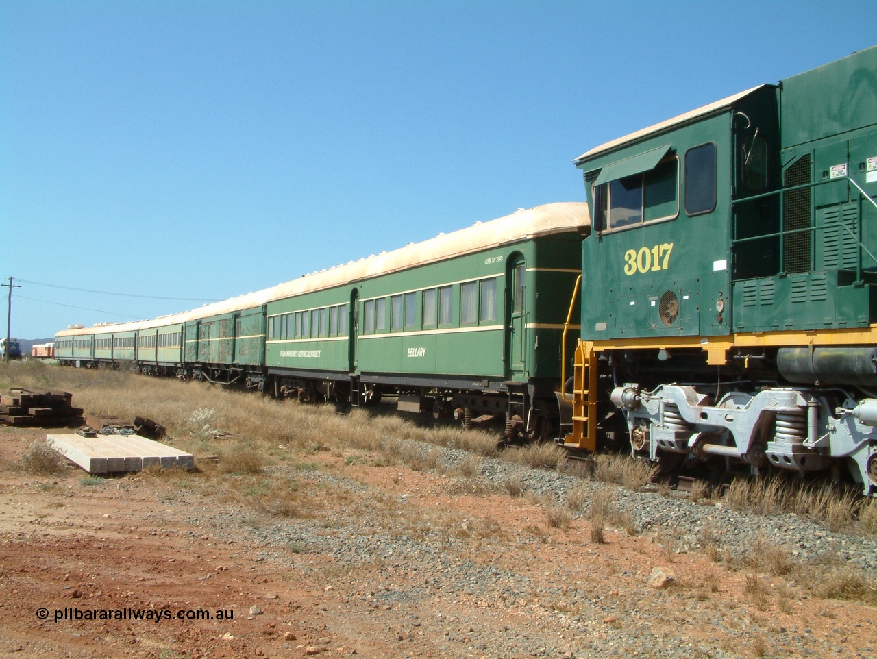 041014 142318
Pilbara Railways Historical Society, view along the passenger carriages behind rebuilt ALCo C636R locomotive 3017 with the first passenger carriage 'Bellany' was originally built by Clyde Engineering at Granville NSW in 1936 for the NSWGR as a second class railway carriage FS type FS 2143. In 1987 it was purchased by the Society and is named after a local river. The next carriage is van 'Portland' and originally an NSWGR MHO type guards van MHO 2321, then recoded to KB type mail van, then to KBY 2513 guards van. 14th October 2004.
Keywords: 3017;Comeng-WA;ALCo;C636R;WA-135-C-6043-04;rebuild;