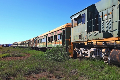 240701 2740
Pilbara Railways Historical Society, view along the passenger carriages behind rebuilt ALCo C636R locomotive 3017 with the first passenger carriage 'Bellary' was originally built by Clyde Engineering at Granville NSW in 1936 for the NSWGR as a second class railway carriage FS type FS 2143. In 1987 it was purchased by the Society and is named after a local river. The next carriage is van 'Portland' and originally an NSWGR MHO type guards van MHO 2321, then recoded to KB type mail van, then to KBY 2513 guards van. For a view 20 years ago, [url=https://pilbararailways.com.au/gallery/displayimage.php?pid=15299]click here[/url]. July 1, 2024.
