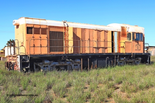 240701 2776
Pilbara Railways Historical Society, Goldsworthy Mining Ltd B class unit 1, an English Electric built ST95B model, originally built in 1965 serial A-104, due to accident damage rebuilt on new frame with serial A-232 in 1970. These units of Bo-Bo design with a 6CSRKT 640 kW prime mover and built at the Rocklea Qld plant. Donated to Society in 1995. 
Keywords: B-class;English-Electric-Qld;ST95B;A-104;A-232;GML;Goldsworthy-Mining;