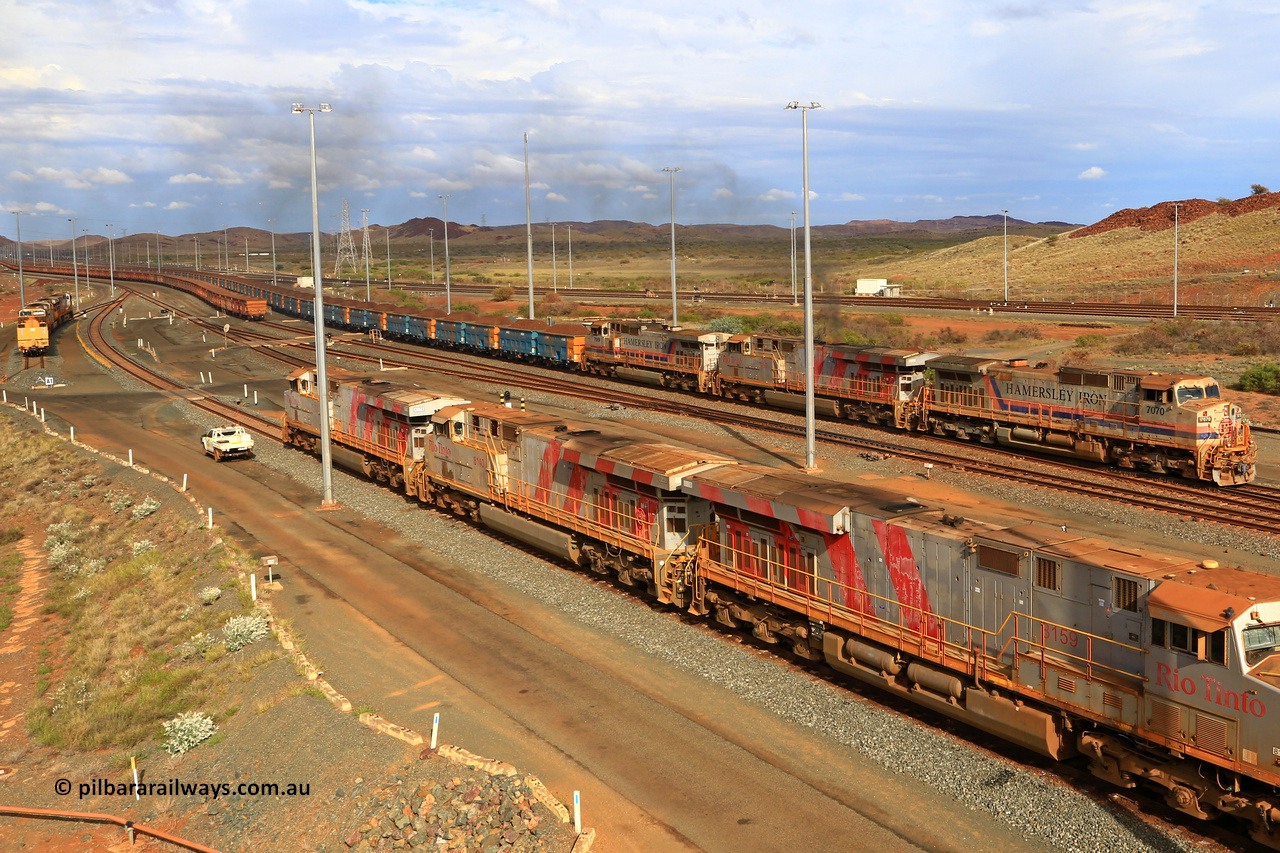 240619 0330
Cape Lambert yard, Hamersley Iron's GE built 9-44CW locomotive 7070 with serial number 47749, delivered in 1995 from the original locomotive order and still looking in pretty good condition despite its age leads a blue rake with an ES44DCi and a sister 9-44CW unit as it snakes through the yard towards the dumper for unloading. Captured on June 19, 2024.
Keywords: 7070;GE;Dash-9-44CW;47749;