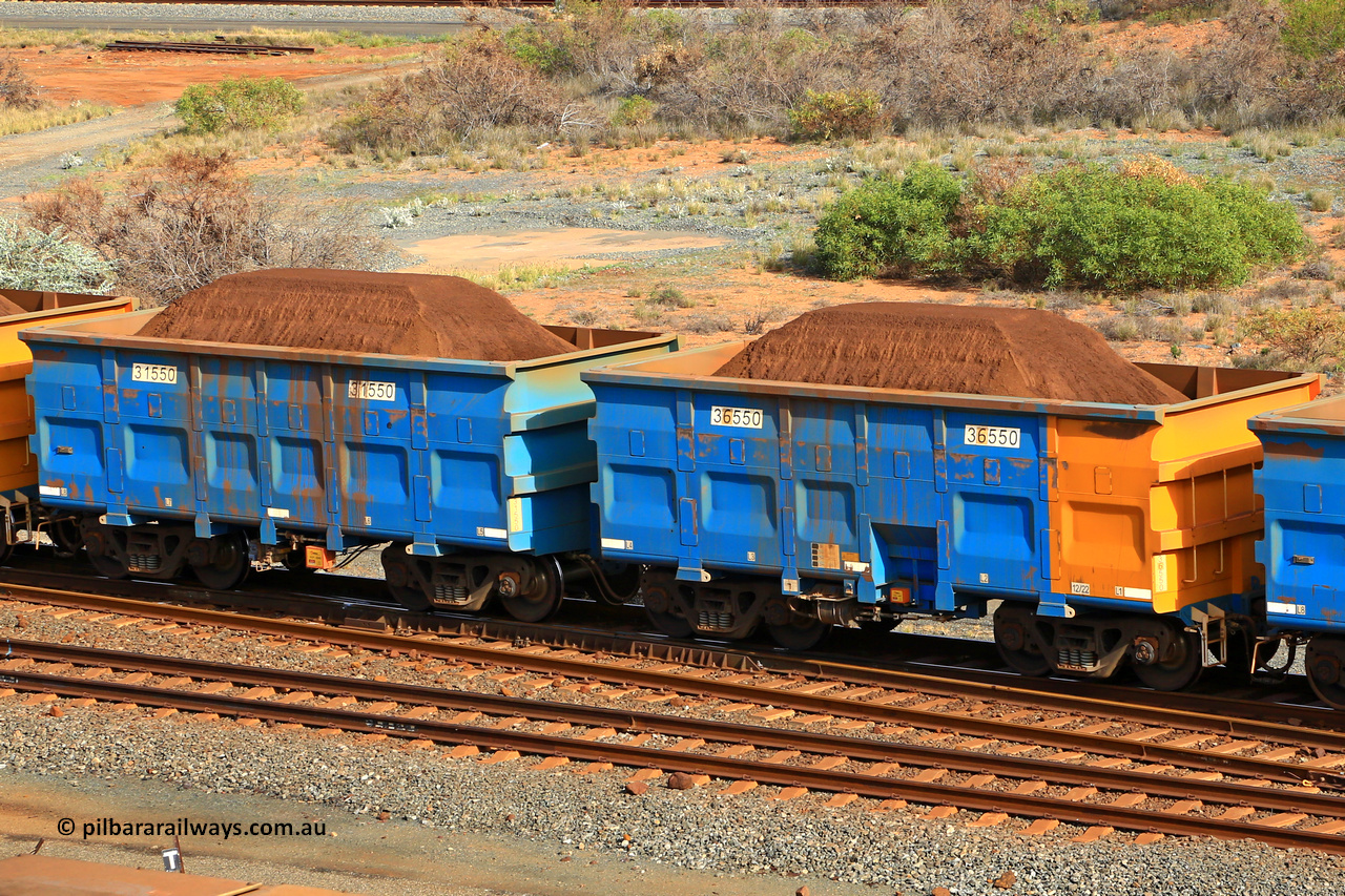 240619 0344
Cape Lambert yard, one of Rio Tinto's blue rakes with spring park brake and only electronic controlled pneumatic [ECP] braking, waggon pair 31550 is a master and is bar coupled to slave waggon 36550 built by China Northen as a Q type in 12/2022. Captured on June 19, 2024.
Keywords: 31550;36550;Q-type;China-Northern;Rio-ore-waggon;