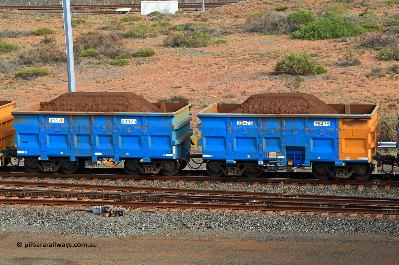 240619 0374
Cape Lambert yard, one of Rio Tinto's blue rakes with spring park brake and only electronic controlled pneumatic [ECP] braking, waggon pair 31475 is a master and is bar coupled to slave waggon 36475 built by China Northen as a Q type in 12/2022. Captured on June 19, 2024.
Keywords: 31475;36475;Q-type;China-Northern;Rio-ore-waggon;