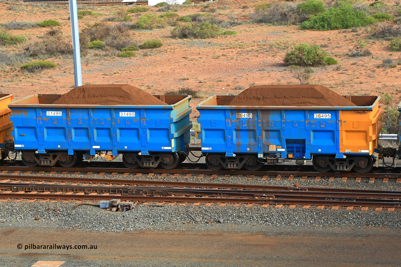 240619 0383
Cape Lambert yard, one of Rio Tinto's blue rakes with spring park brake and only electronic controlled pneumatic [ECP] braking, waggon pair 31495 is a master and is bar coupled to slave waggon 36495 built by China Northen as a Q type in 12/2022. Captured on June 19, 2024.
Keywords: 31495;36495;Q-type;China-Northern;Rio-ore-waggon;